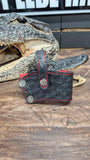 CUSTOM 1911 HOLSTER IN BLACK OSTRICH WITH RED SUEDE INTERIOR AND STITCHING (SUELA ROJA)